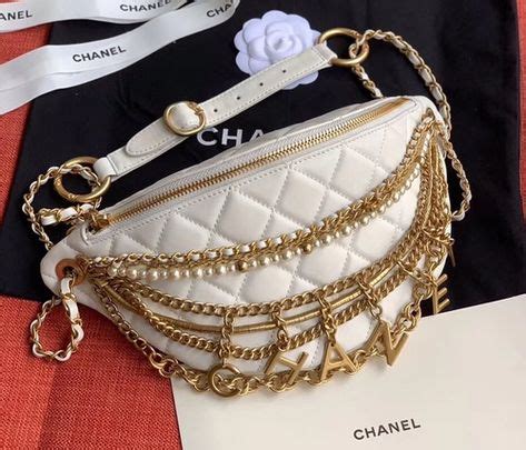 chanel waist bag white|More.